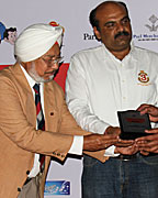 Brig. Phoolka and Mr BS Manco presenting a Memento to Mr Nikhal Jaspal and Mr Gulpreet Aulakh of team Chandigarh Adventure Sports