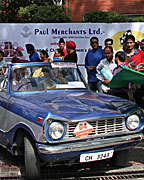 JD Ghai handing over the flag to Mr Naunihal Singh