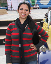 Spectators posing with the Vintage Car at Elante Chandigarh