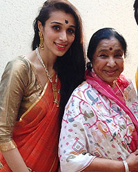 Tanisha Verma Lahiri, Asha Bhosle and Bappa Lahiri during the Saraswati Puja at Bappi Lahiri's residence