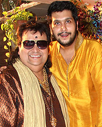 Bappi Lahiri and Bappa Lahiri during the Saraswati Puja at their residence