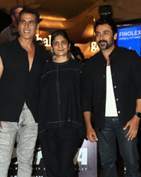 Amskay Kumar, Director Sudha Kongara and Suriya