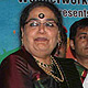 Usha Uthup and Vineet Khetrapal giving cheque to NGO