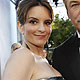 Tina Fey and Alec Baldwin, from the television series '30 Rock,' pose as they arrive at the 18th annual Screen Actors Guild Awards in Los Angeles