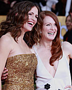 Actresses Jennifer Garner (L) and Julianne Moore arrive at the 19th annual Screen Actors Guild Awards in Los Angeles, California