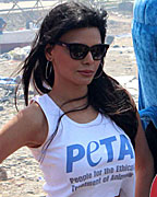 Sherlyn Chopra with Peta's gaint condoms to promote safe sex for animals