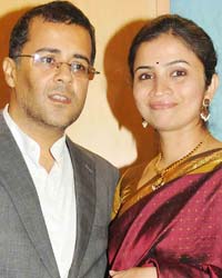 Chetan Bhagat with his wife