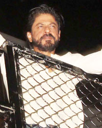 Shah Rukh Khan waves to his fans on the eve of his 50th birthday at his residence Maanat in Mumbai