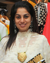 Designer Manju Bhende with a platter of her colourful designs