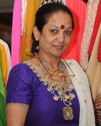 Designer Manju Bhende with a platter of her colourful designs