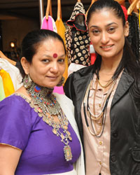 Designer Manju Bhende with a platter of her colourful designs