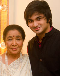 Asha Bhosle and Siddhant Bhosle perform at a concert