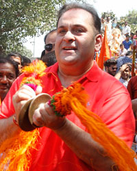 Rajeev Kapoor, participates in a procession for the immersion of R K Studios idol of Lord Ganesh on the final day of the Ganesh festival