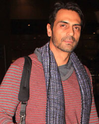 Arjun Rampal Varun Dhawan snapped at international airport Mumbai