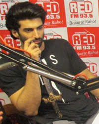 Aditya Roy Kapur and Katrina Kaif with RJ Malishka at 93.5 Red FM studio for 'Fitoor'