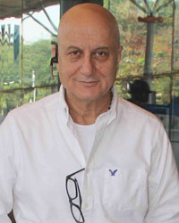 Anupam Kher Snapped at Domestic Airport