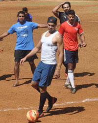 Dino Morea playing football with friends