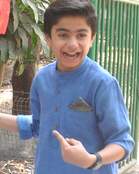 Hollywood actor Neel Sethi pose with elephant during the promotion of film The Jungle Book at Sir JJ school of Art campus in Mumbai