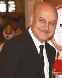 President Pranab Mukherjee presents Padma Bhushan Award to Bollywood star Anupam Kher