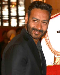 President Pranab Mukherjee presents Padma Bhushan Award to Bollywood star Ajay Devgn