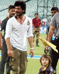 Shah Rukh Khan with his son AbRam Khan enters the field after the 2016 Indian Premier League