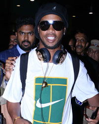 Brazilian soccr player Ronaldinho snapped at airport