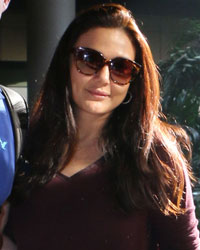 Preity Zinta with her husband Gene Goodenough snapped at airport