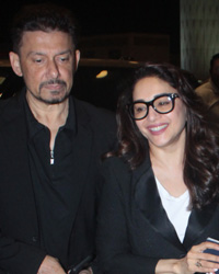 Shriram Madhav Nene and Madhuri Dixit at airport