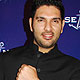 Yuvraj Singh poses during the unveiling of  Ulysse Nardin limited edition watches