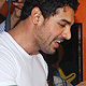 John Abraham  and Mahendra Singh Dhoni at Mad-o-Wat salon