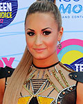 U.S singer Demi Lovato arrives for the Teen Choice 2012 awards in Los Angeles