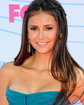 Actress Nina Dobrev of Canada arrives for the Teen Choice 2012 awards in Los Angeles