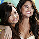 Demi Lovato and Selena Gomez pose together as they arrive at the Teen Choice Awards in Los Angeles