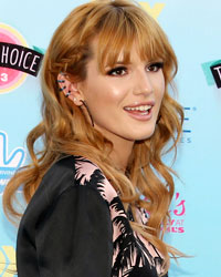 Actress Bella Thorne poses as she arrives at the Teen Choice Awards at the Gibson amphitheatre in Universal City, California