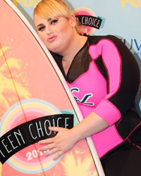 Australian actress Rebel Wilson poses after winning the Choice Actress in a comedy film for her role as Fat Amy in 'Pitch Perfect' at the Teen Choice Awards at the Gibson amphitheatre in Universal City, California