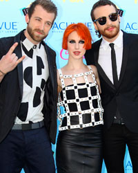 Members of the band Paramore pose as they arrive at the Teen Choice Awards at the Gibson amphitheatre in Universal City, California