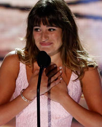 Actress Lea Michele accepts the Choice TV Actress: Comedy Award, next to 'Glee' co-stars (L-R) Jenna Ushkowitz, Amber Riley and Kevin McHale at the Teen Choice Awards at the Gibson amphitheatre in Universal City, California