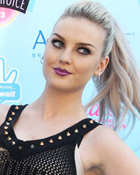 Members of the British girl group 'Little Mix' pose as they arrive at the Teen Choice Awards at the Gibson amphitheatre in Universal City, California