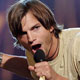 Actor Ashton Kutcher accepts the award for Choice Movie Rockstar Moment at the 2005 Teen Choice Awards at the Gibson Amphitheater in Universal City, California.