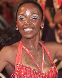 A woman dances a candombe during the 'llamadas' parade in Montevideo