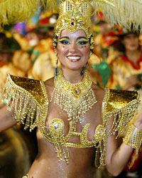 A woman dances the candombe during the 'Llamadas' parade in Montevideo