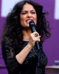 Actress Salma Hayek-Pinault speaks at 'The Sound of Change' concert at Twickenham Stadium in London