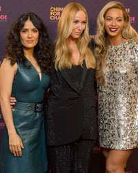 Salma Hayek, Frida Giannini and Beyonce Knowles, founders of the Chime for Change charity, pose for photographers at the Sound of Change concert at Twickenham Stadium in London