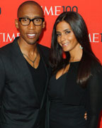 Singer Raphael Saadiq arrives with Lisa Porter for the Time 100 gala celebrating the magazine's naming of the 100 most influential people in the world for the past year in New York