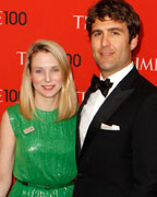 President and CEO of Yahoo, Marissa Mayer, arrives with Zachary Bogue for the Time 100 gala celebrating the magazine's naming of the 100 most influential people in the world for the past year