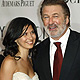 Actor Alec Baldwin and guest pose as they arrive during the American Theatre Wing's 65th annual Tony Awards ceremony in New York