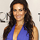 Laura Benanti, nominated for Best Performance by an Actress in a Featured Role in a Musical poses as she arrives during the American Theatre Wing's 65th annual Tony Awards ceremony in New York