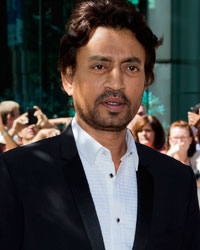 Indian actor Irrfan Khan arrives for the screening of the film 'Dabba (The Lunchbox)' at the 38th Toronto International Film Festival