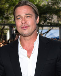 Actor Brad Pitt arrives for the '12 Years a Slave' movie screening at the 38th Toronto International Film Festival in Toronto