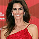 Cindy Crawford poses for photographers as she arrives for the opening ceremony of the 68th Venice Film Festival